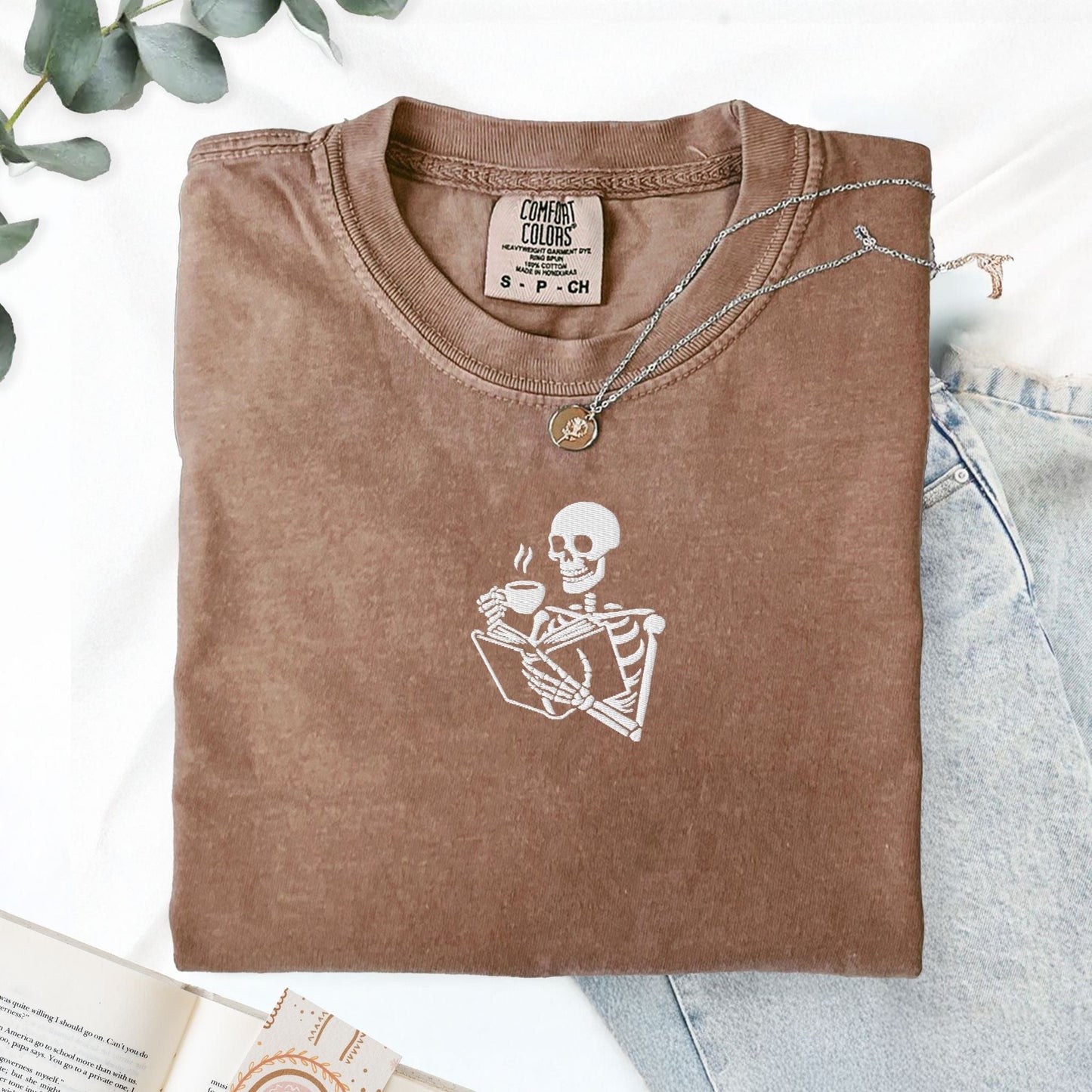 My Store Embroidered Skeleton Reading a Book Spooky Cute T-Shirt Embroidered Skeleton Reading a Book Spooky Cute T-Shirt