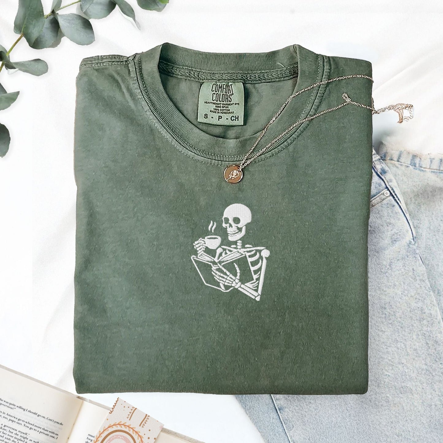 My Store Embroidered Skeleton Reading a Book Spooky Cute T-Shirt Embroidered Skeleton Reading a Book Spooky Cute T-Shirt