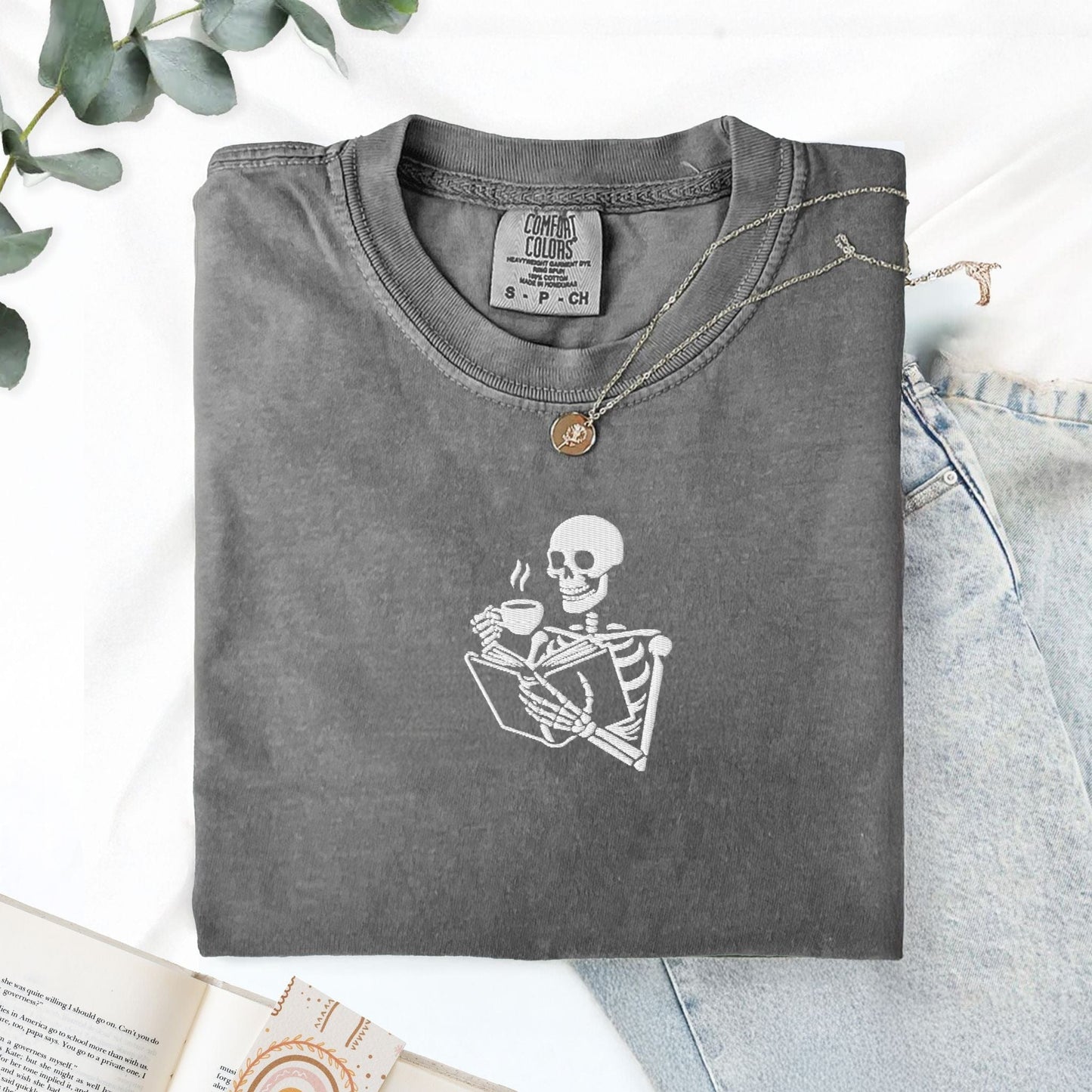 My Store Embroidered Skeleton Reading a Book Spooky Cute T-Shirt Embroidered Skeleton Reading a Book Spooky Cute T-Shirt
