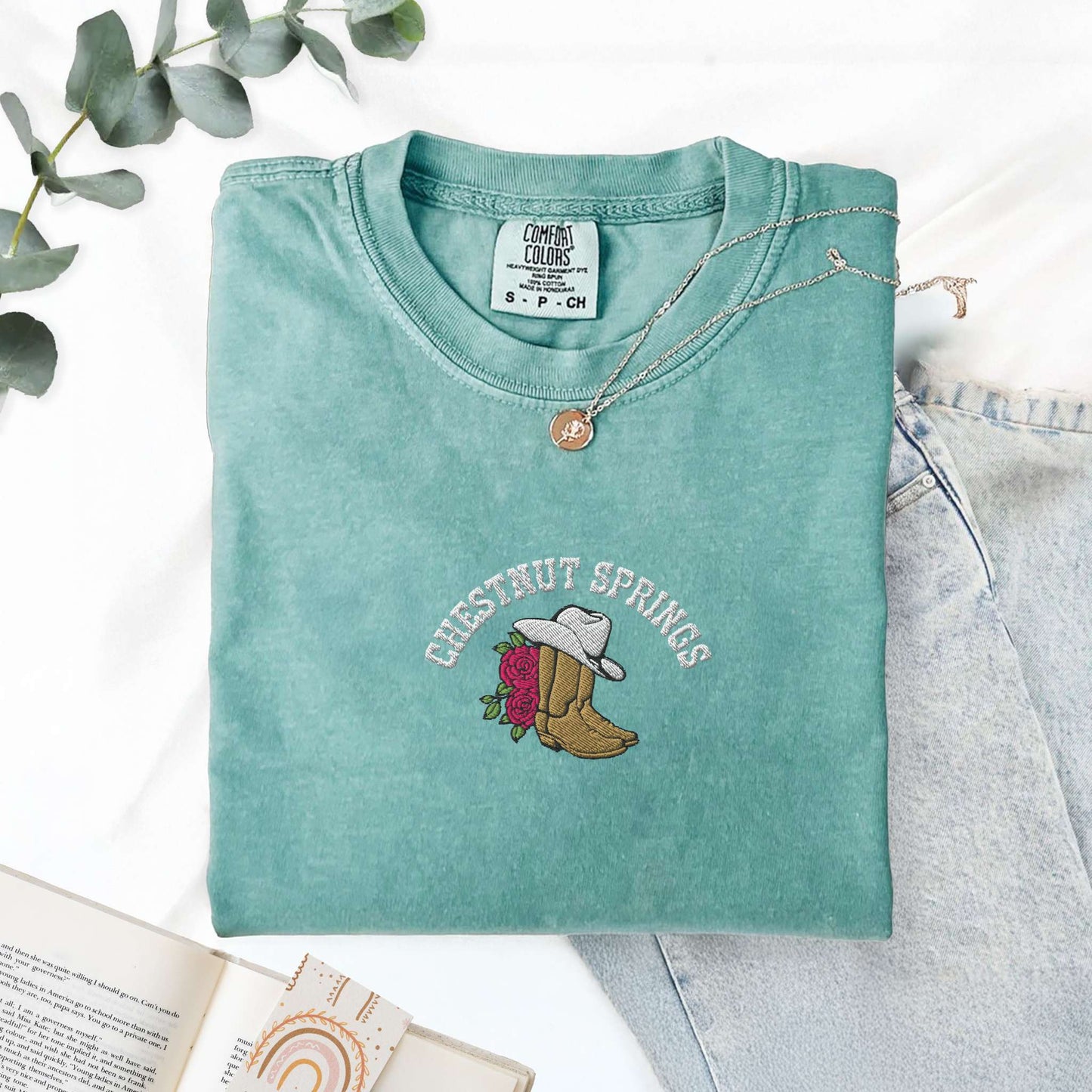 My Store Embroidered Chestnut Springs Bookish Cowgirl T-shirt Embroidered Chestnut Springs Bookish Cowgirl T-shirt