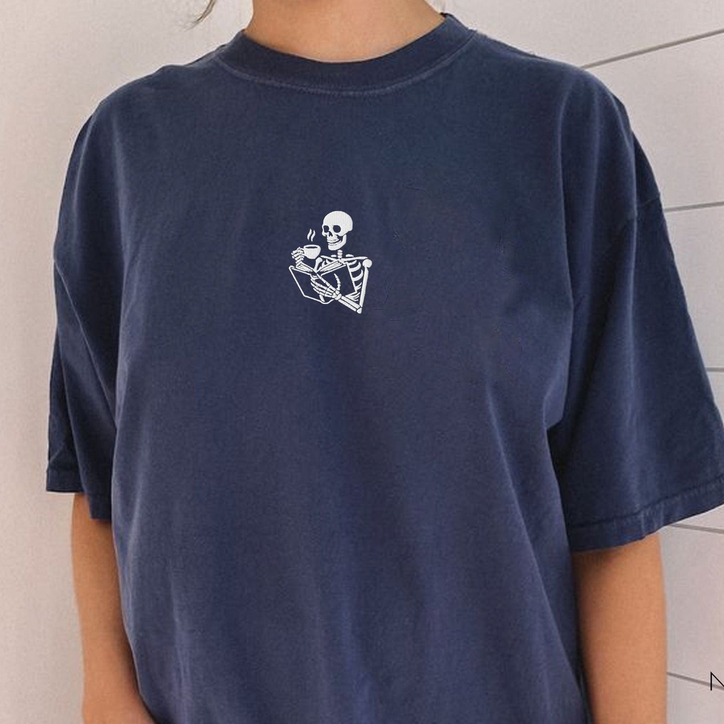 My Store Embroidered Skeleton Reading a Book Spooky Cute T-Shirt Embroidered Skeleton Reading a Book Spooky Cute T-Shirt
