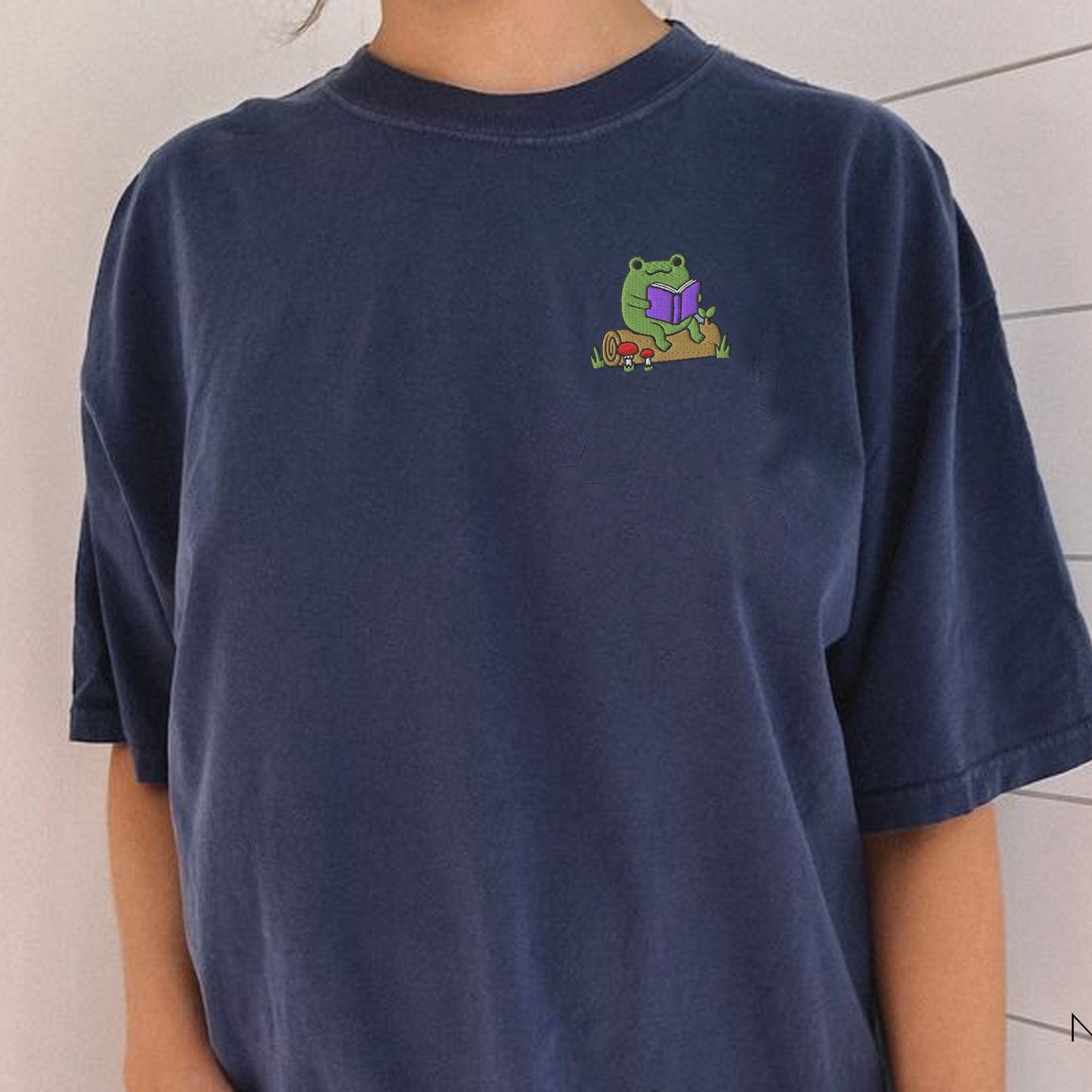 My Store Frog Reading On A Log Cute Embroidered Frog T-Shirt Frog Reading On A Log Cute Embroidered Frog T-Shirt