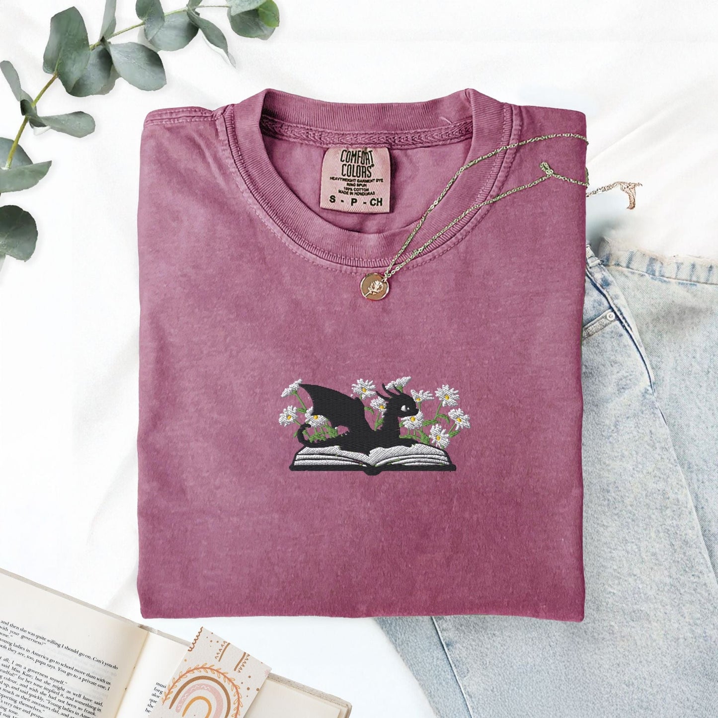 Pine Spice Books Embroidered Dragon and Book with Daisies T-Shirt Embroidered Dragon and Book with Daisies T-Shirt