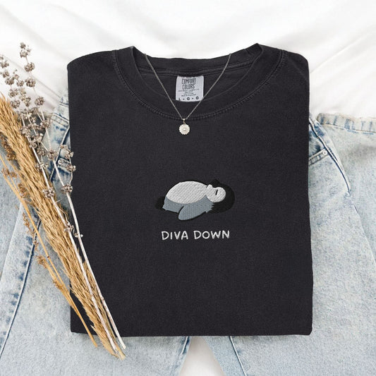 Pine Spice Books Diva Down Penguin Embroidered T-Shirt Diva Down Penguin Embroidered T-Shirt