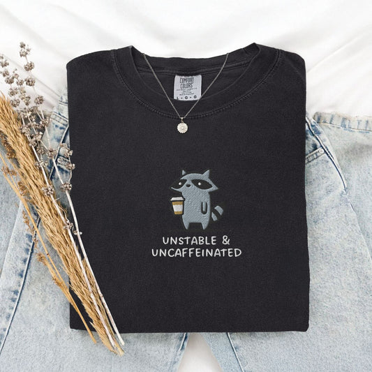 Pine Spice Books Unstable And Uncaffeinated Raccoon Embroidered T-Shirt Unstable And Uncaffeinated Raccoon Embroidered T-Shirt