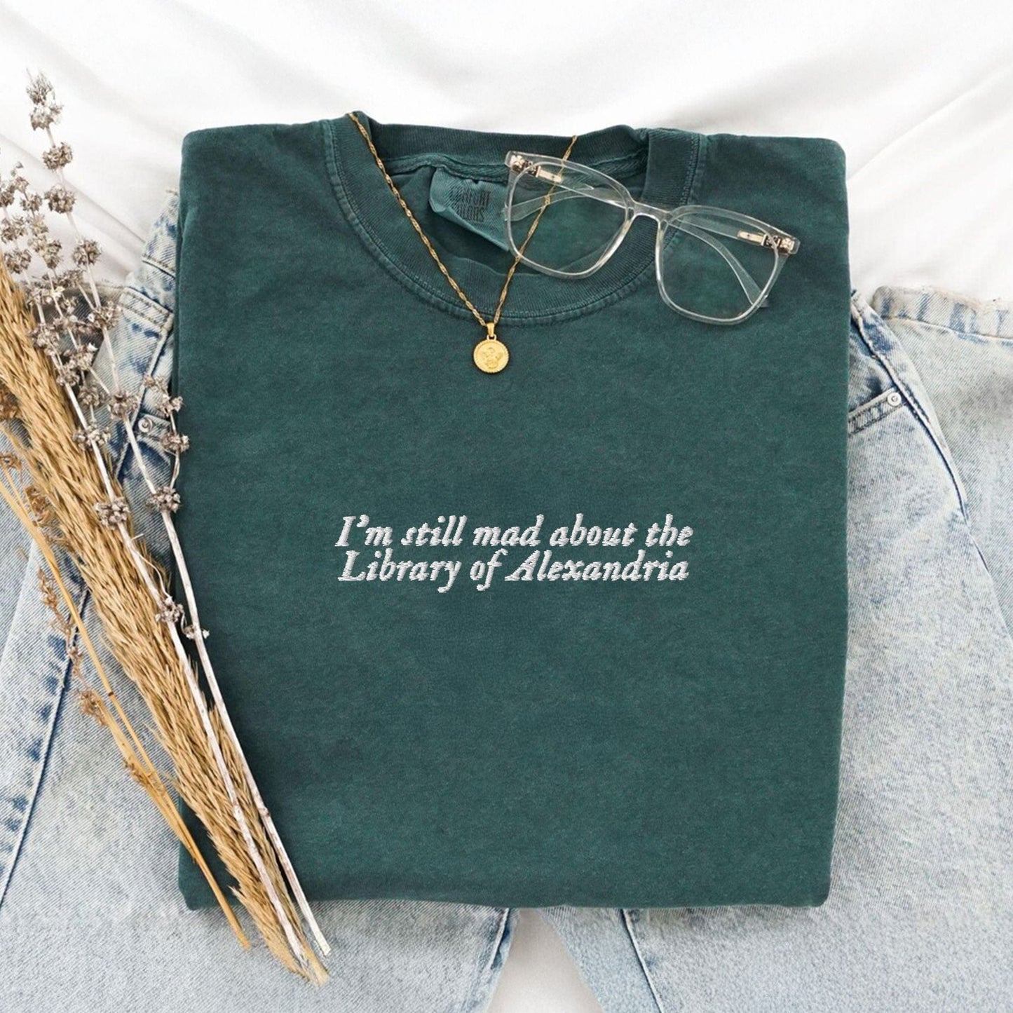 Pine Spice Books I’m Still Mad About the Library of Alexandria Embroidered T-Shirt I’m Still Mad About the Library of Alexandria Embroidered T-Shirt