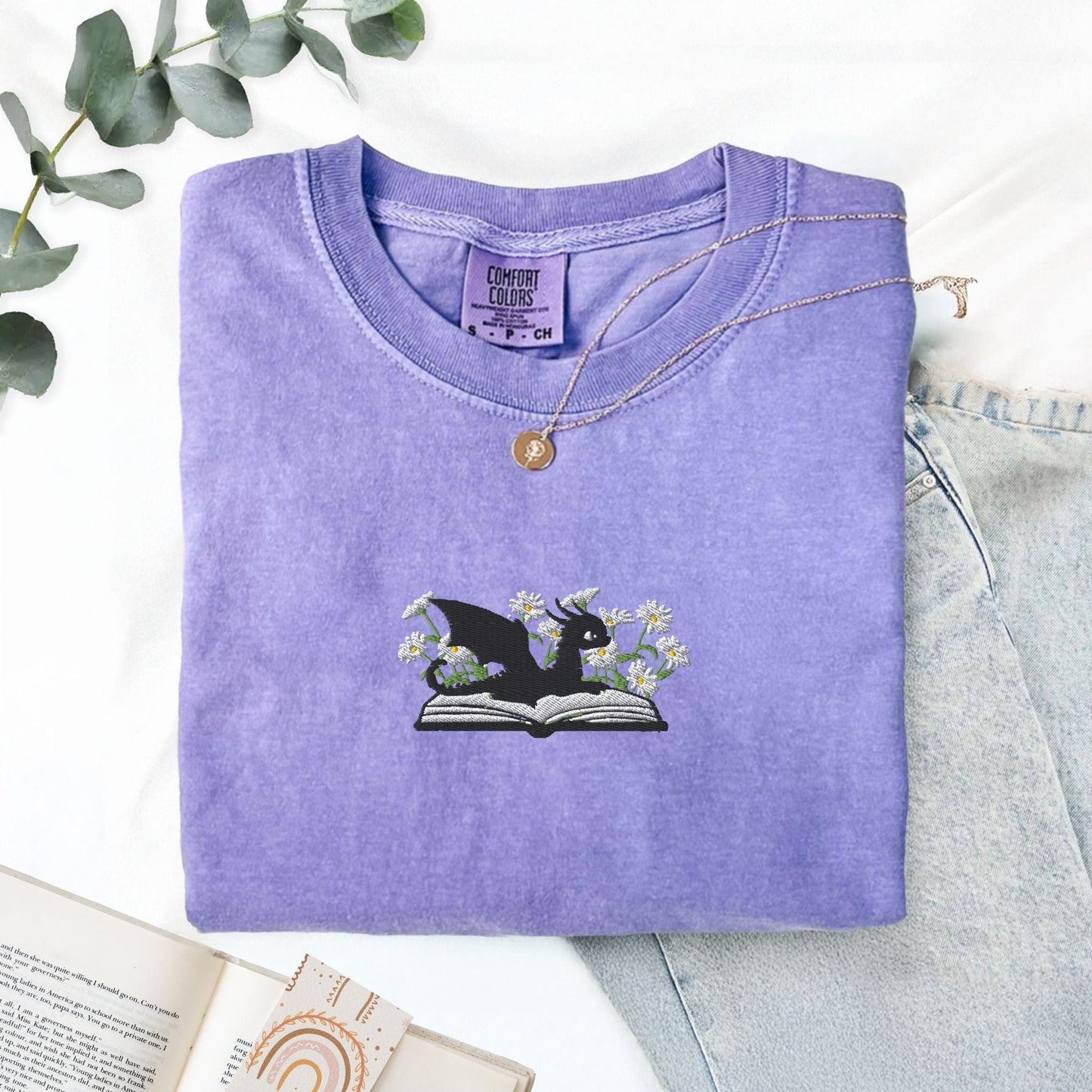 Pine Spice Books Embroidered Dragon and Book with Daisies T-Shirt Embroidered Dragon and Book with Daisies T-Shirt
