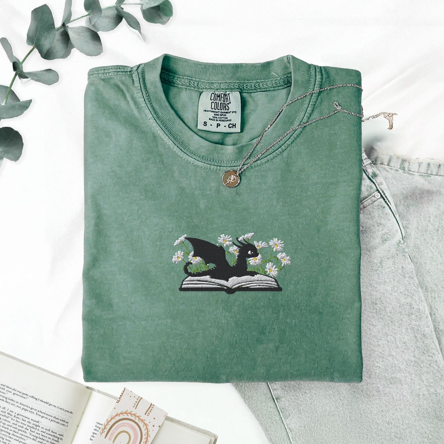 Pine Spice Books Embroidered Dragon and Book with Daisies T-Shirt Embroidered Dragon and Book with Daisies T-Shirt
