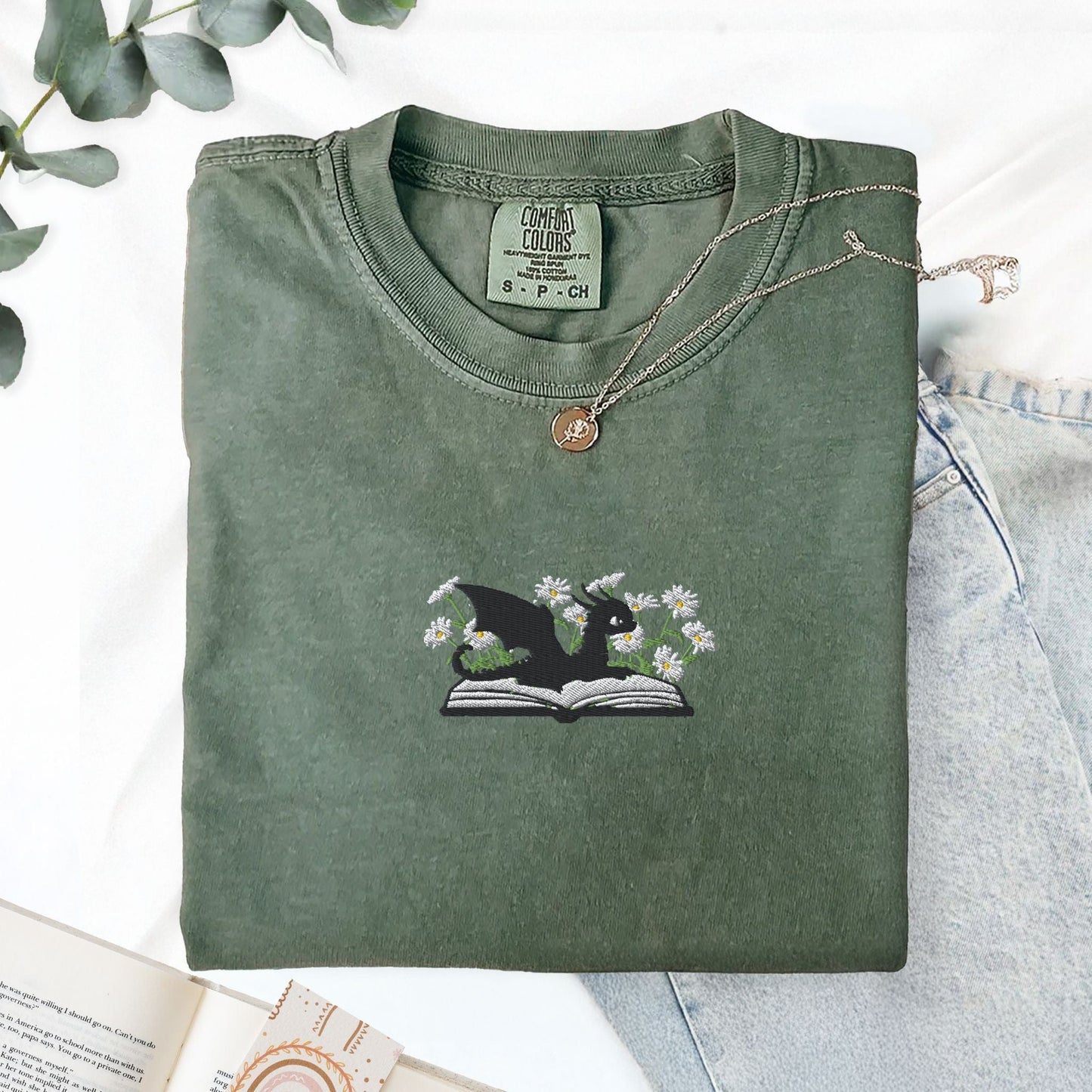 Pine Spice Books Embroidered Dragon and Book with Daisies T-Shirt Embroidered Dragon and Book with Daisies T-Shirt