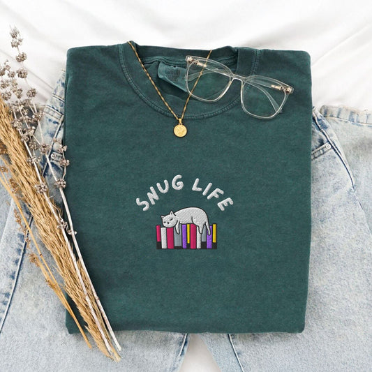 My Store Snug Life Embroidered Cat and Books Cozy T-Shirt Snug Life Embroidered Cat and Books Cozy T-Shirt