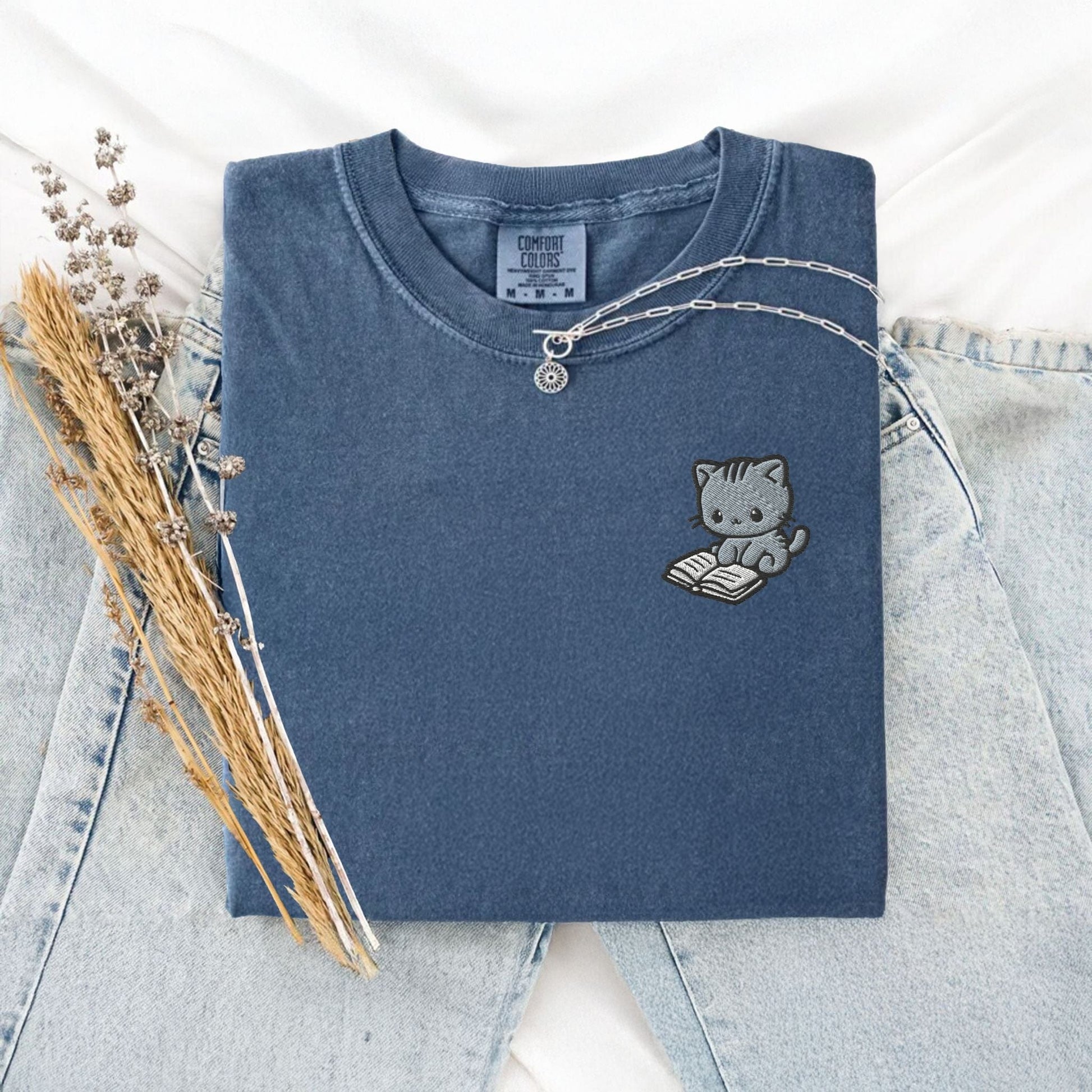 My Store Cute Embroidered Cat Reading a Book Comfort Colors T-Shirt Cute Embroidered Cat Reading a Book Comfort Colors T-Shirt