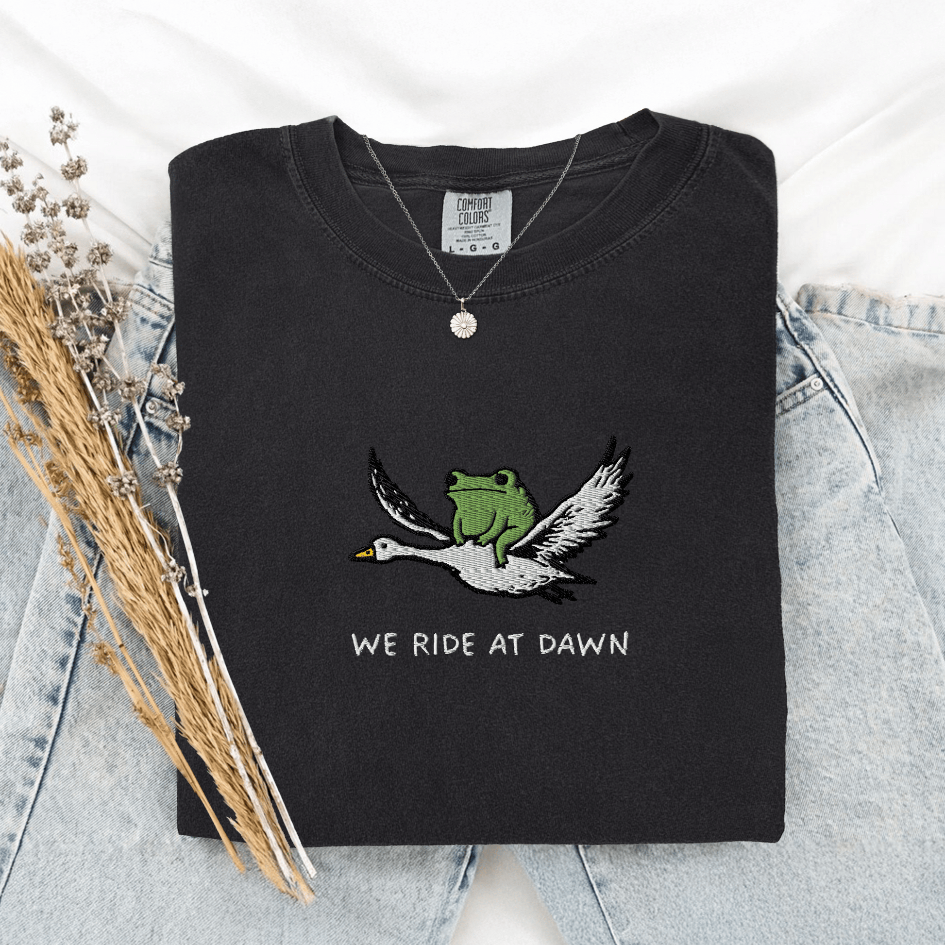 Pine Spice Books We Ride At Dawn Frog Goose Embroidered T-Shirt We Ride At Dawn Frog Goose Embroidered T-Shirt