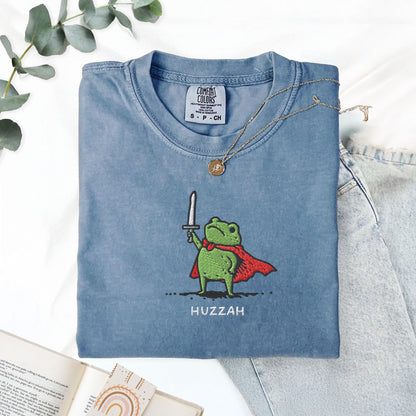 Pine Spice Books Huzzah Frog Embroidered T-Shirt – Comfort Colors 1717 Huzzah Frog Embroidered T-Shirt – Comfort Colors 1717