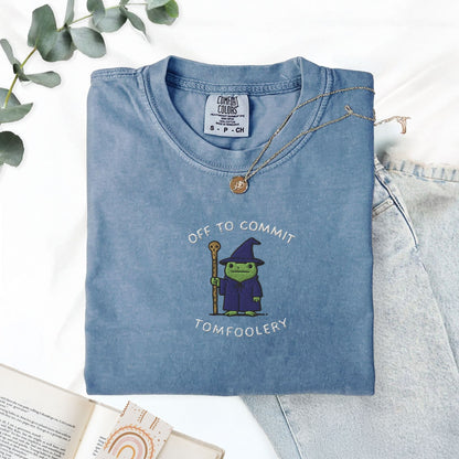 Pine Spice Books Off To Commit Tomfoolery Embroidered Frog T-Shirt Off To Commit Tomfoolery Embroidered Frog T-Shirt
