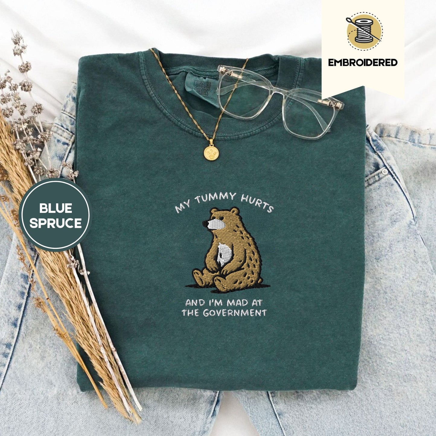 Pine Spice Books Tummy Hurts Embroidered T-Shirt Tummy Hurts Embroidered T-Shirt