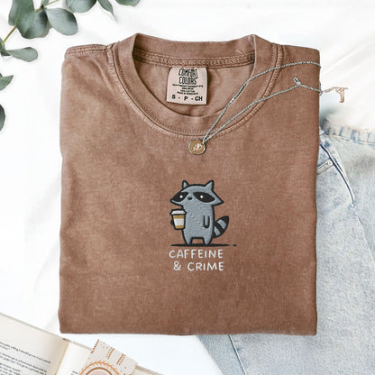 Pine Spice Books Caffeine And Crime Embroidered Raccoon T-Shirt Caffeine And Crime Embroidered Raccoon T-Shirt