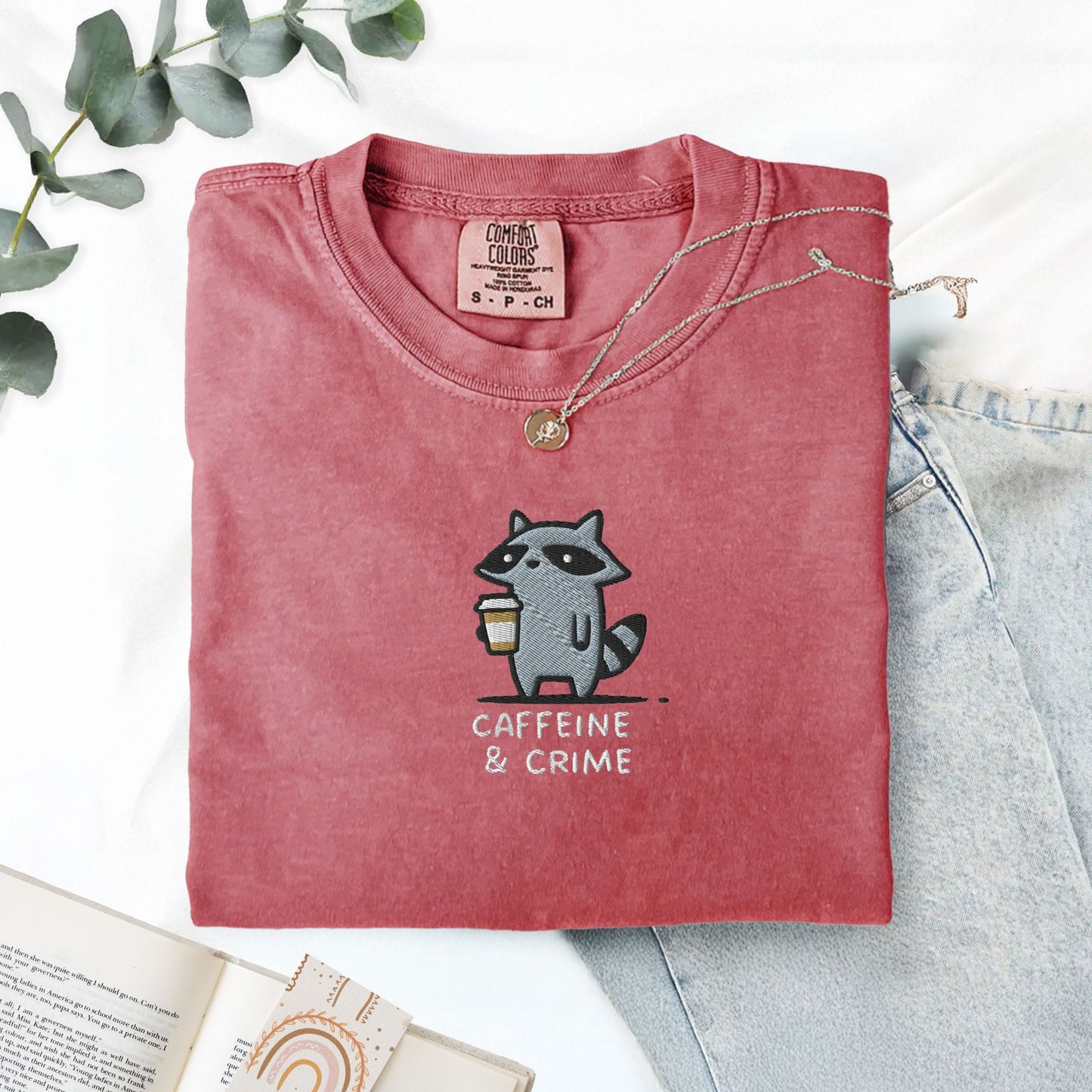 Pine Spice Books Caffeine And Crime Embroidered Raccoon T-Shirt Caffeine And Crime Embroidered Raccoon T-Shirt