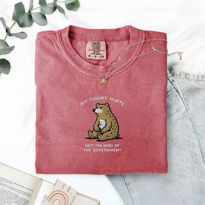 Pine Spice Books Tummy Hurts Embroidered T-Shirt Tummy Hurts Embroidered T-Shirt