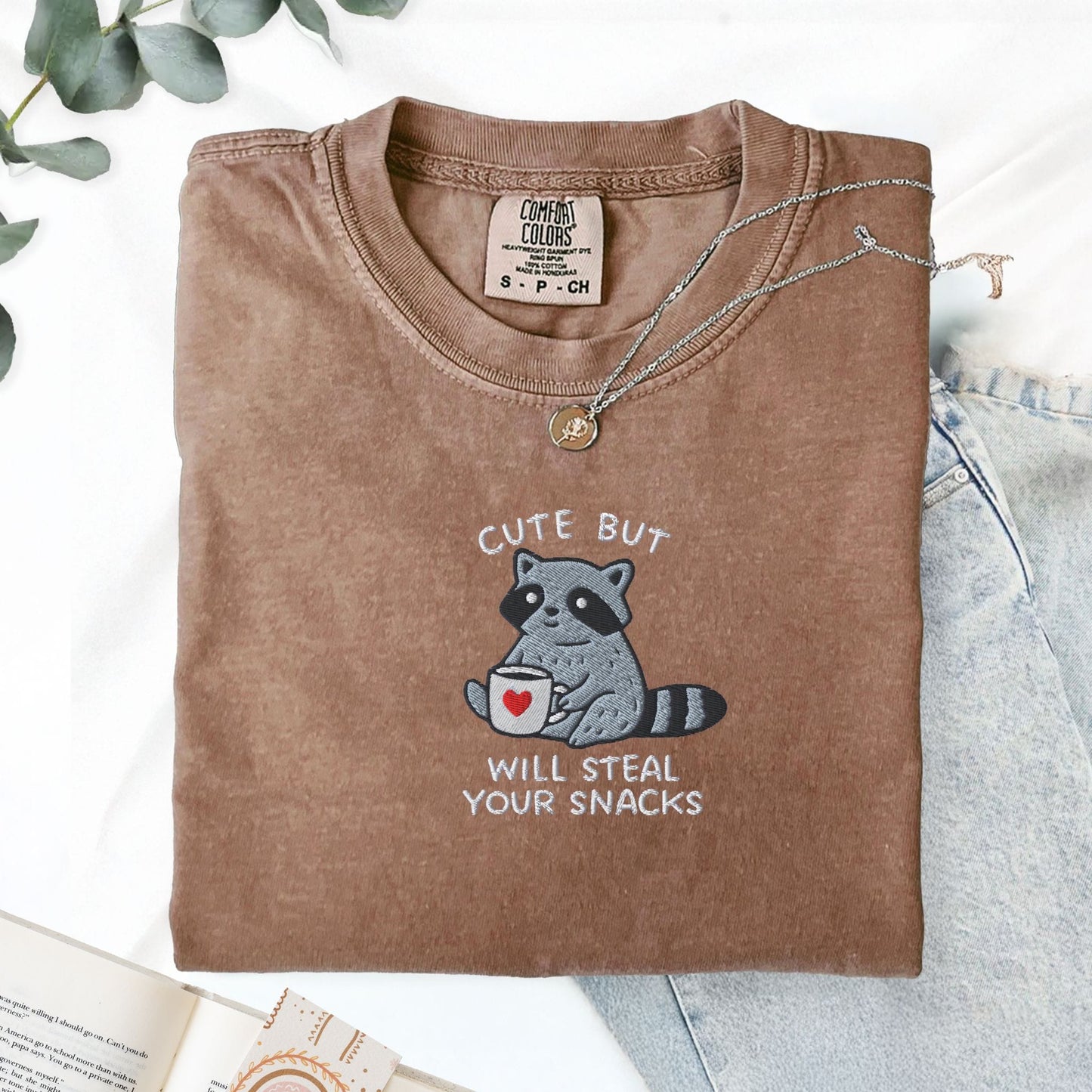 Pine Spice Books Cute But Will Steal Your Snacks Raccoon Embroidered T-Shirt Cute But Will Steal Your Snacks Raccoon Embroidered T-Shirt