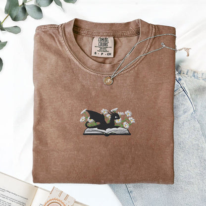 Pine Spice Books Embroidered Dragon and Book with Daisies T-Shirt Embroidered Dragon and Book with Daisies T-Shirt