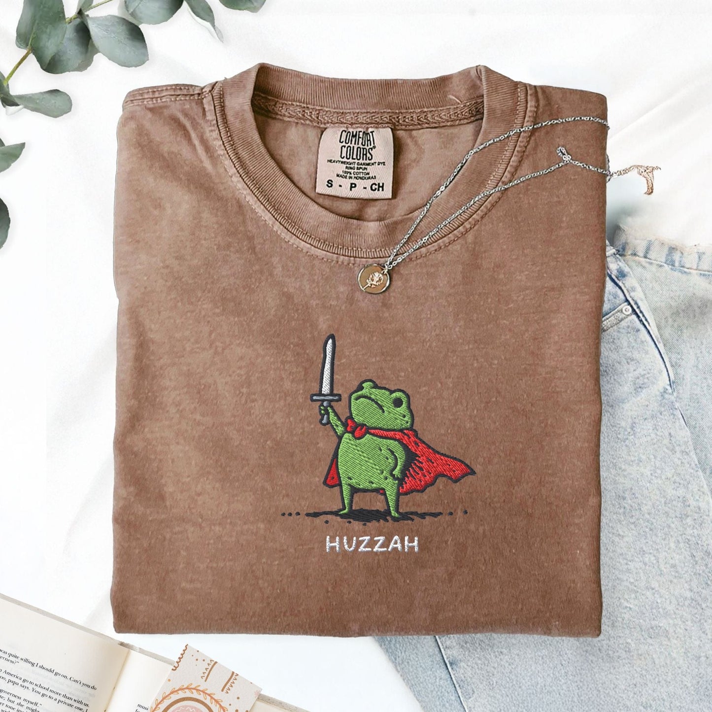 Pine Spice Books Huzzah Frog Embroidered T-Shirt – Comfort Colors 1717 Huzzah Frog Embroidered T-Shirt – Comfort Colors 1717