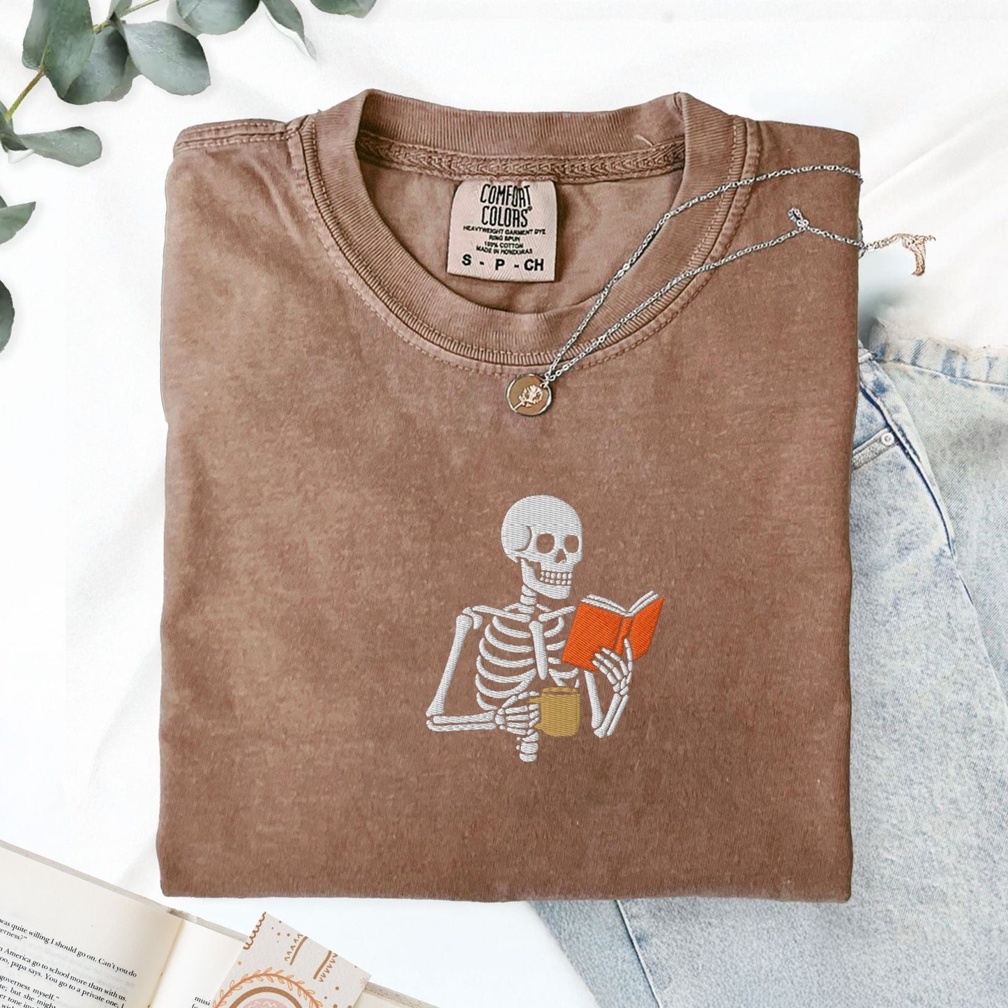 Pine Spice Books Skeleton Reading a Book T-Shirt Skeleton Reading a Book T-Shirt