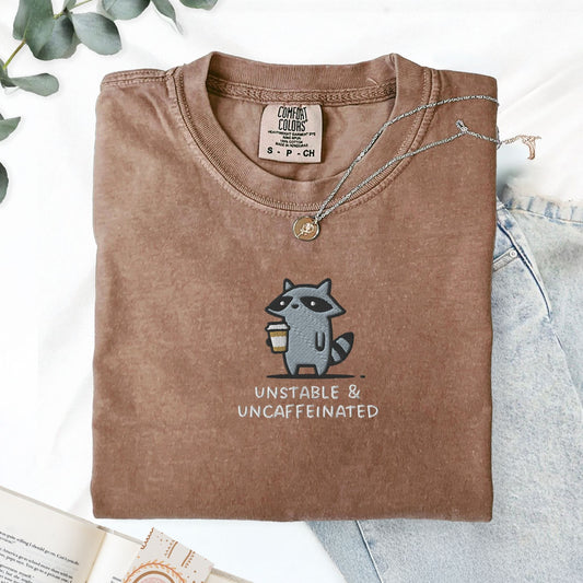Pine Spice Books Unstable And Uncaffeinated Raccoon Embroidered T-Shirt Unstable And Uncaffeinated Raccoon Embroidered T-Shirt