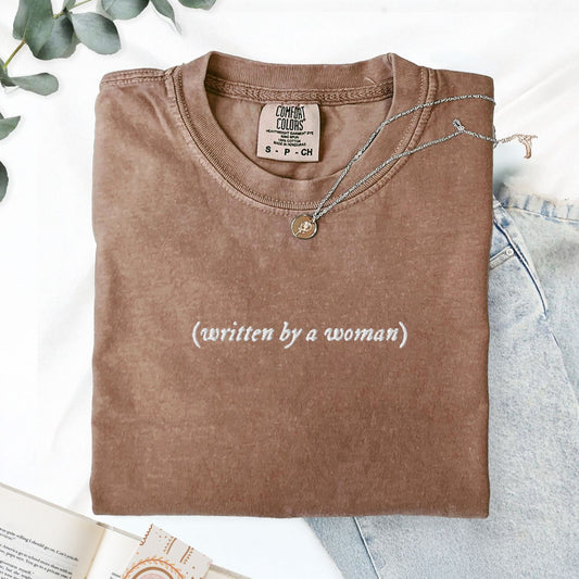 Pine Spice Books Written By A Woman Embroidered T-Shirt Written By A Woman Embroidered T-Shirt