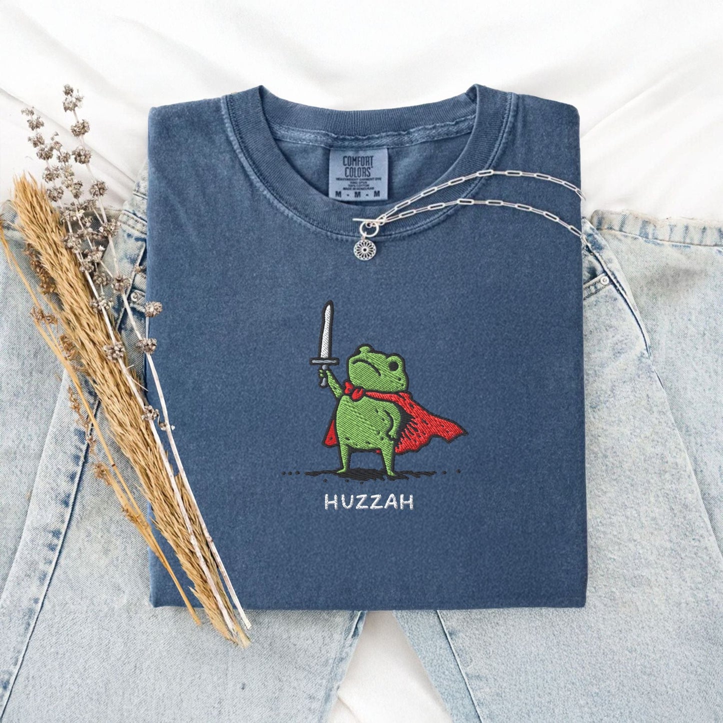 Pine Spice Books Huzzah Frog Embroidered T-Shirt – Comfort Colors 1717 Huzzah Frog Embroidered T-Shirt – Comfort Colors 1717