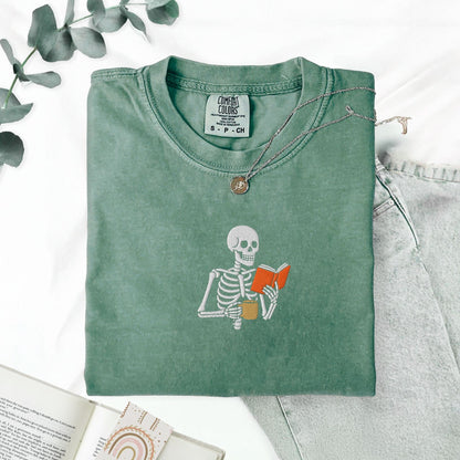 Pine Spice Books Skeleton Reading a Book T-Shirt Skeleton Reading a Book T-Shirt