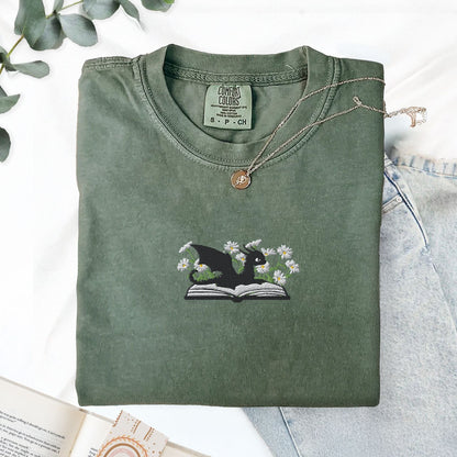 Pine Spice Books Embroidered Dragon and Book with Daisies T-Shirt Embroidered Dragon and Book with Daisies T-Shirt