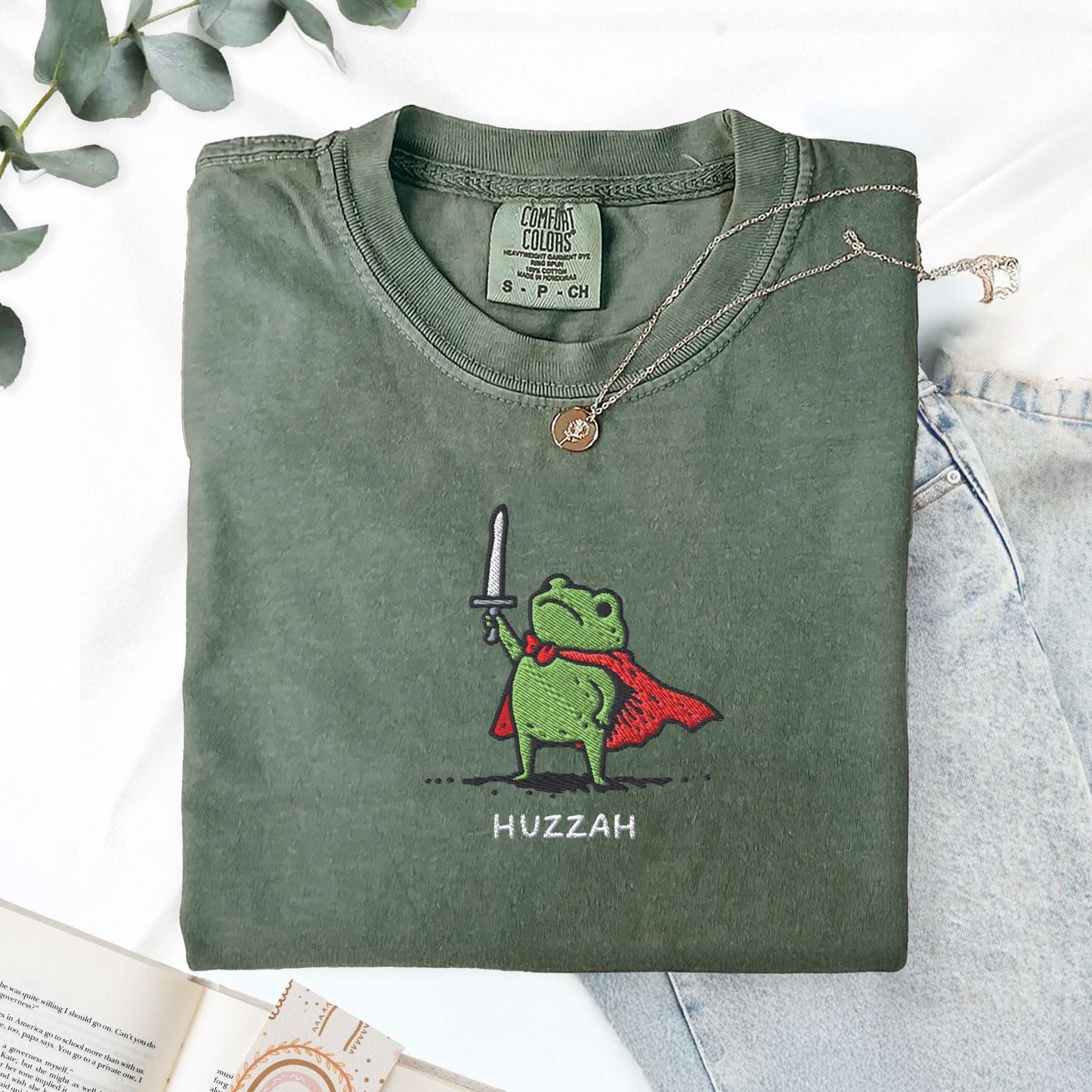 Pine Spice Books Huzzah Frog Embroidered T-Shirt – Comfort Colors 1717 Huzzah Frog Embroidered T-Shirt – Comfort Colors 1717