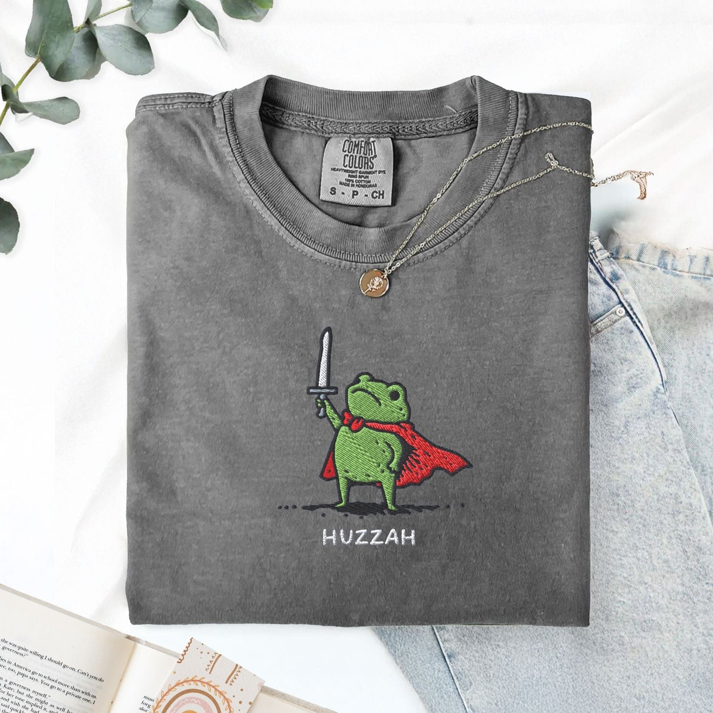 Pine Spice Books Huzzah Frog Embroidered T-Shirt – Comfort Colors 1717 Huzzah Frog Embroidered T-Shirt – Comfort Colors 1717
