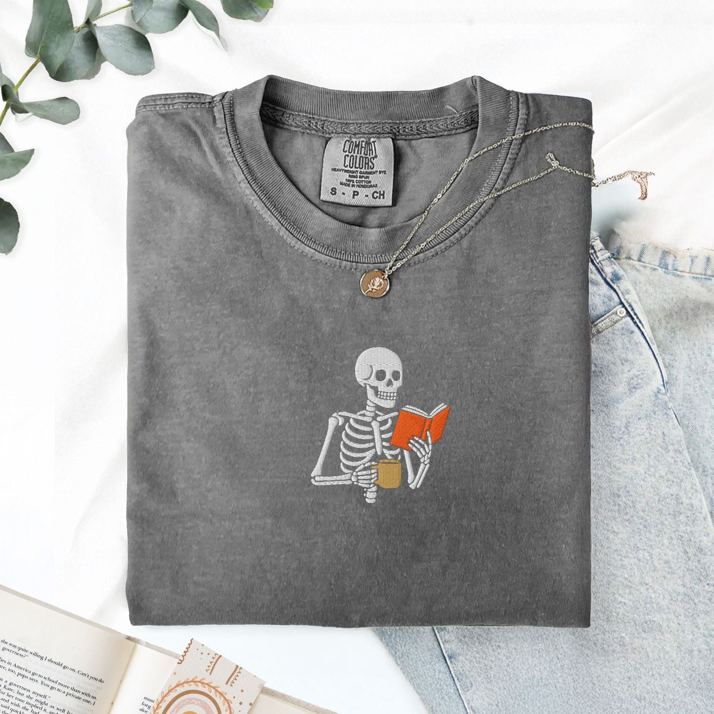Pine Spice Books Skeleton Reading a Book T-Shirt Skeleton Reading a Book T-Shirt