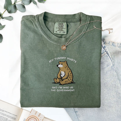 Pine Spice Books Tummy Hurts Embroidered T-Shirt Tummy Hurts Embroidered T-Shirt