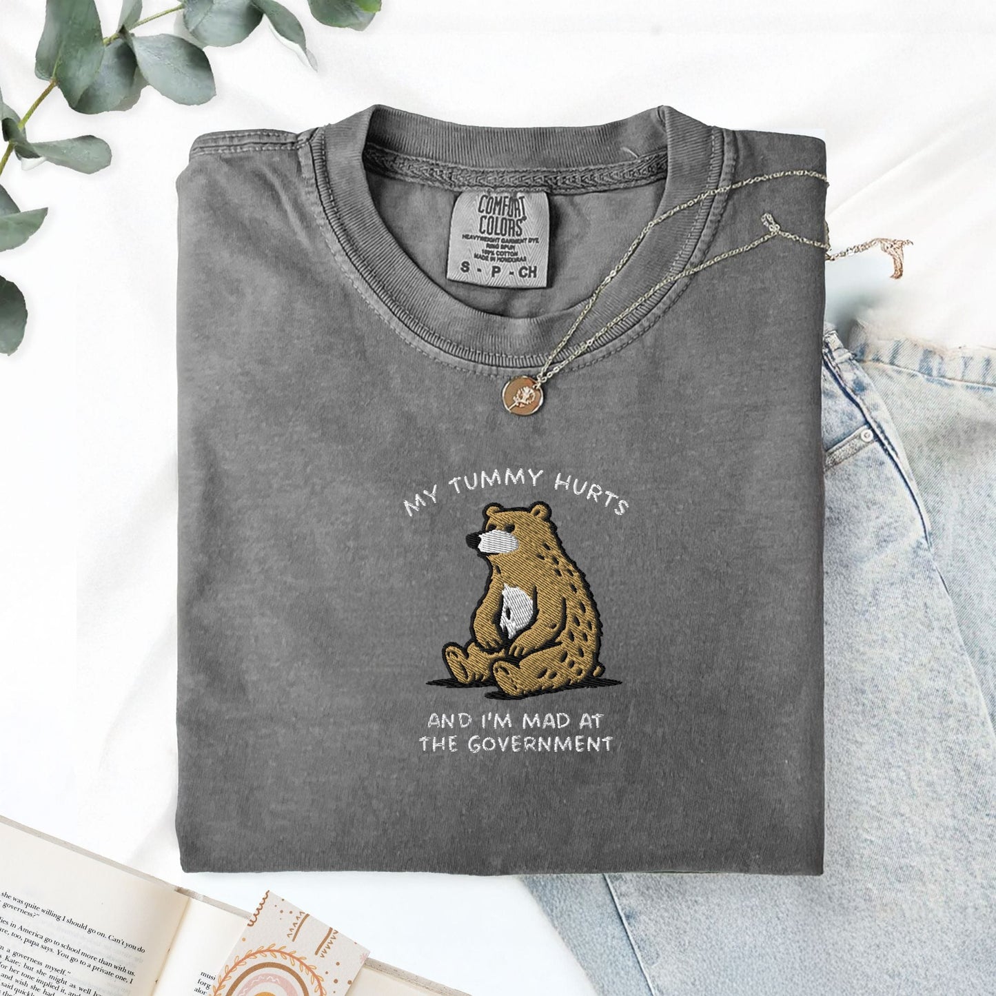 Pine Spice Books Tummy Hurts Embroidered T-Shirt Tummy Hurts Embroidered T-Shirt