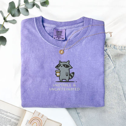 Pine Spice Books Unstable And Uncaffeinated Raccoon Embroidered T-Shirt Unstable And Uncaffeinated Raccoon Embroidered T-Shirt